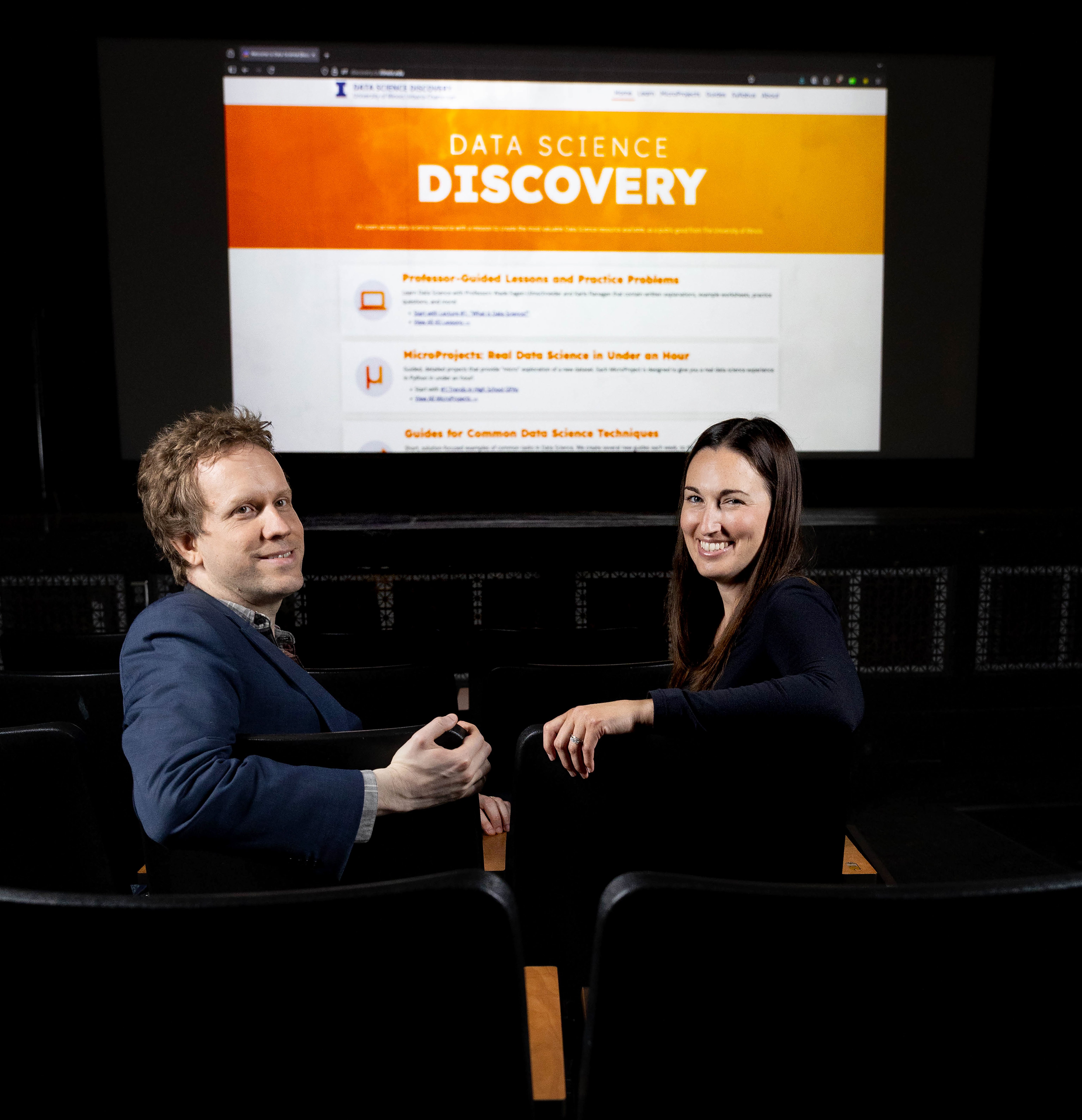 Wade Fagen-Ulmschneider, a Computer Science professor, joins Karle Flanagan, a statistics professor, in bringing their STAT/CS/IS 107: Data Science Discovery to life at Foellinger Auditorium on July 8 2025. The duo, who also have a podcast, are helping Illinois Grainger Engineering and U of I lead the way in interdisciplinary data science education through the innovative X + DS program. The program was launched in 2021 and is growing.