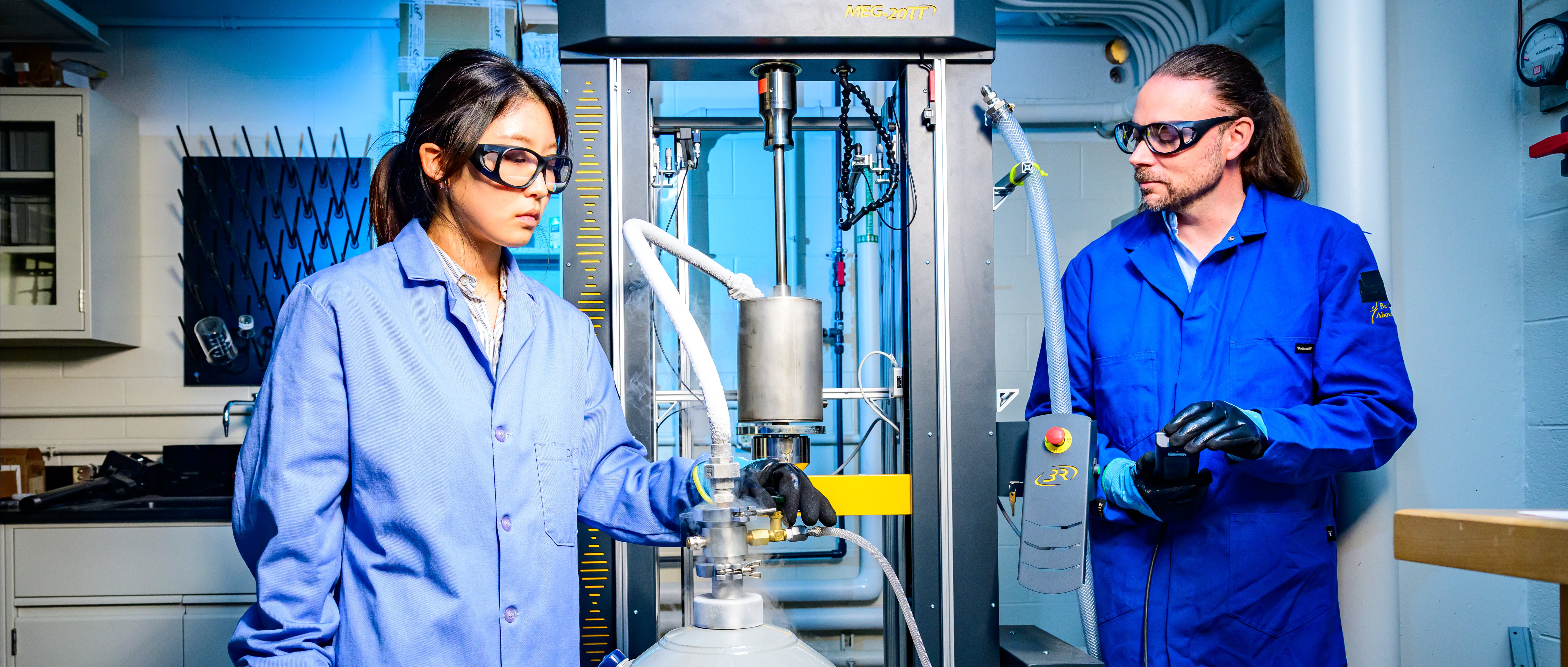 A researcher works with Jean-Charles Stinville in the Stinville Research Group labs in the Materials Science and Engineering building.