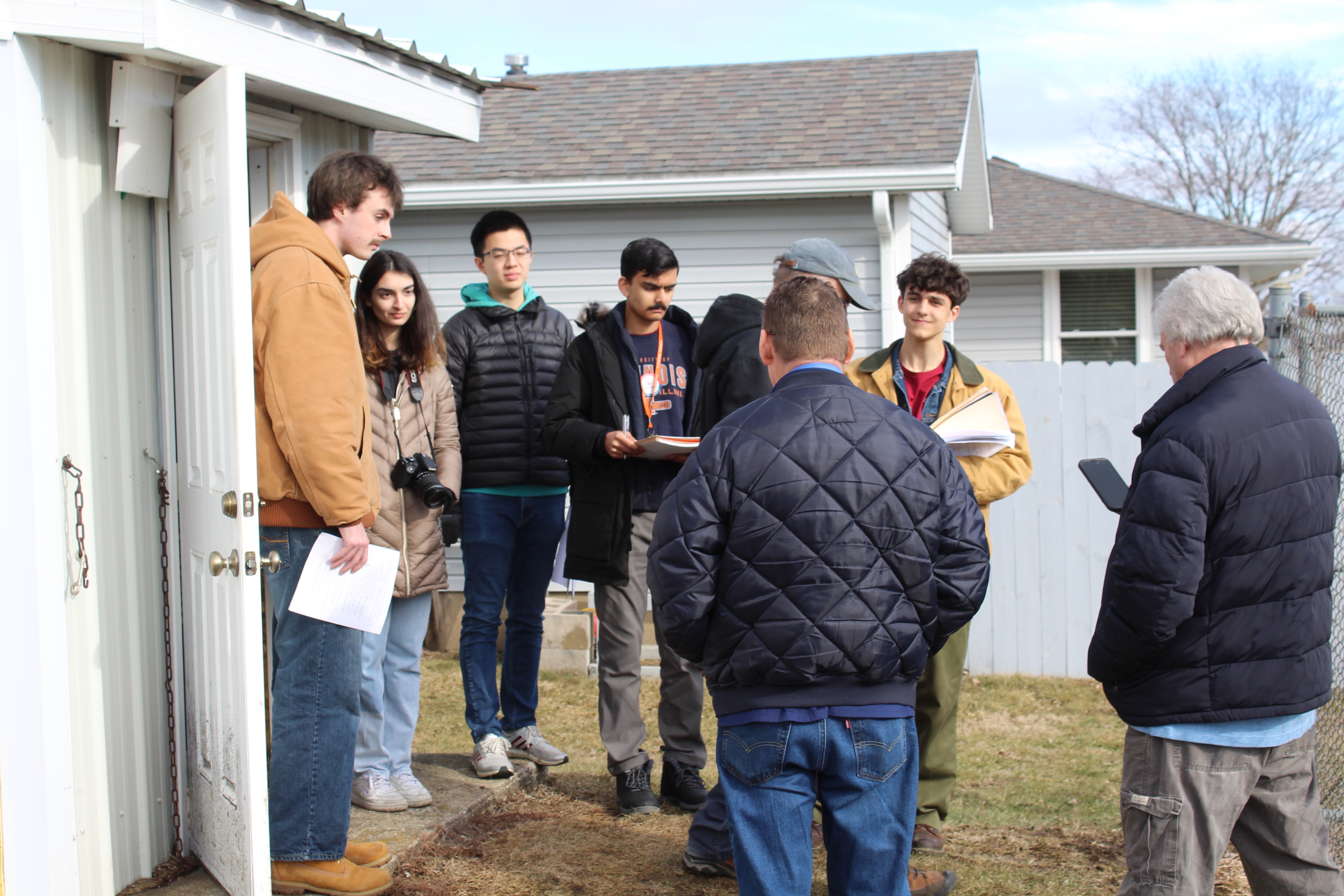EWB volunteers and local contacts outside the Woodford, IL Chemical Shed.