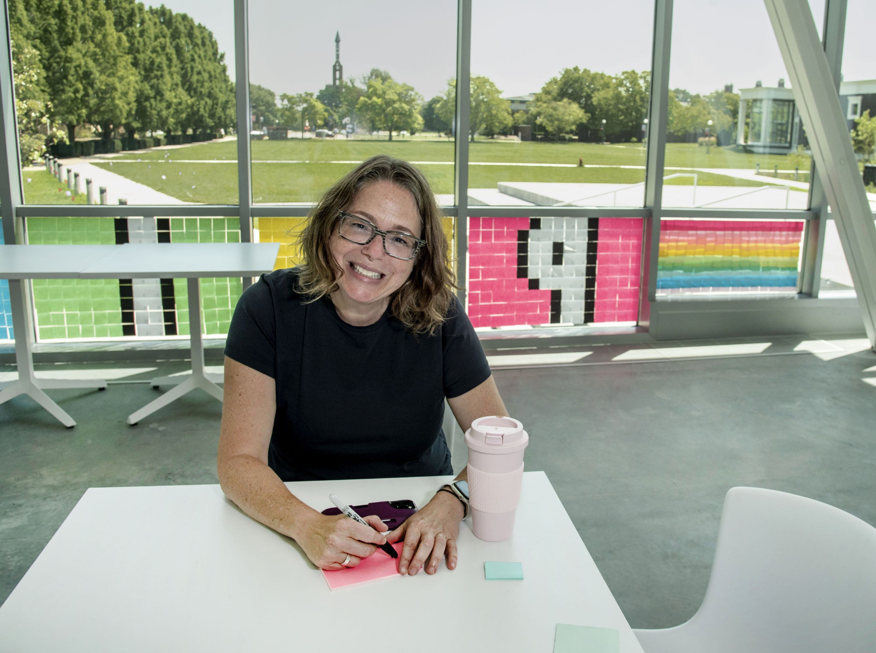 Rachel Switzky, director of Siebel Center for Design, sits in a couple of her favorite areas of the facility.
