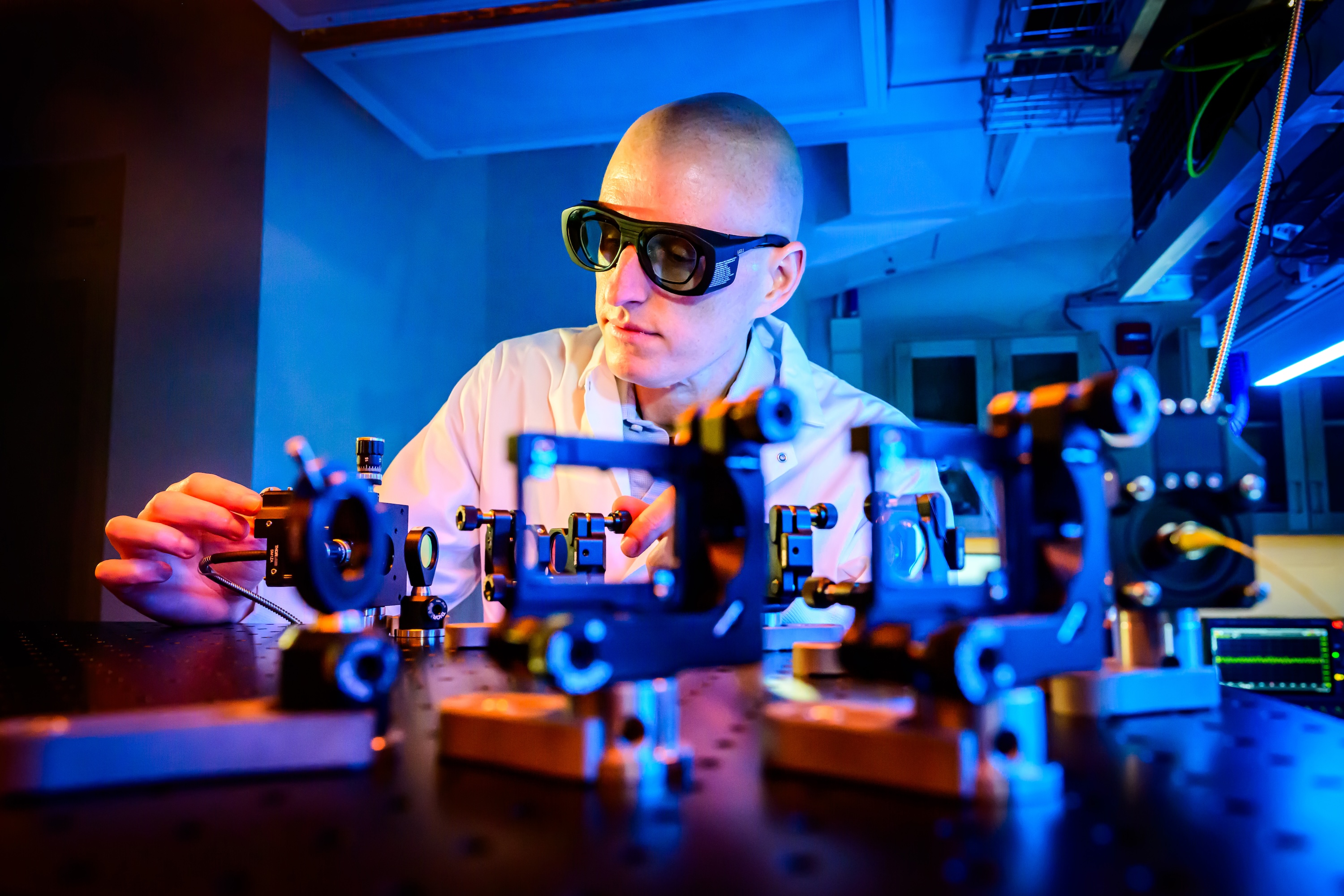 Materials Science and Engineering Professor Chris Anderson works in the the Anderson lab, which combines materials science, applied physics, and electrical engineering to manipulate and generate photons with solid-state materials.