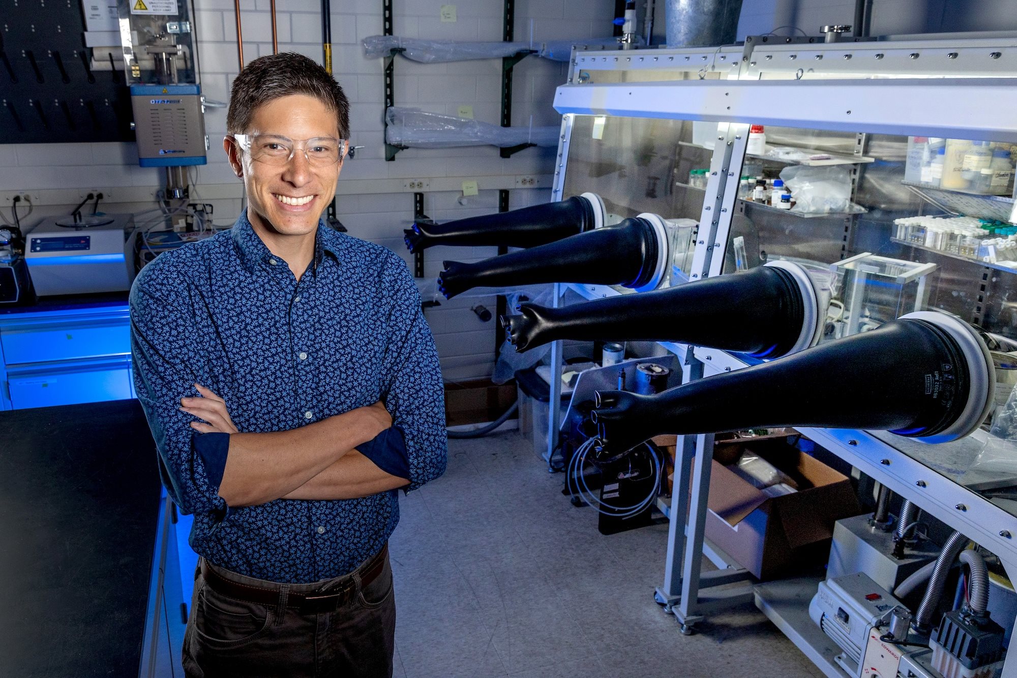 Materials Science and Engineering Professor and Racheff Faculty Fellow Daniel Shoemaker, pictured standing near a glove box in one of his labs at the Materials Research Lab