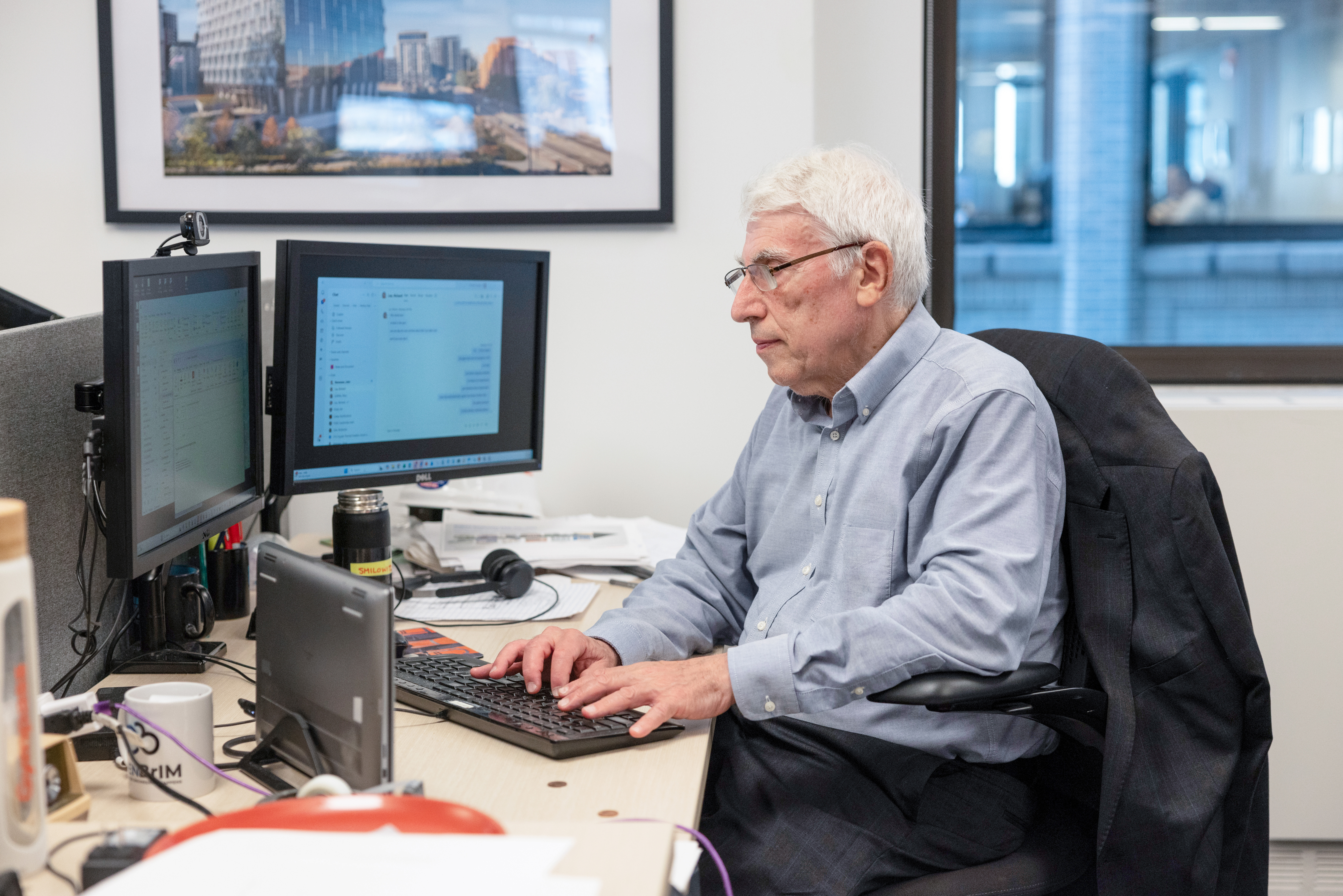Bob Smilowitz at his desk at Thornton Tomesetti.
