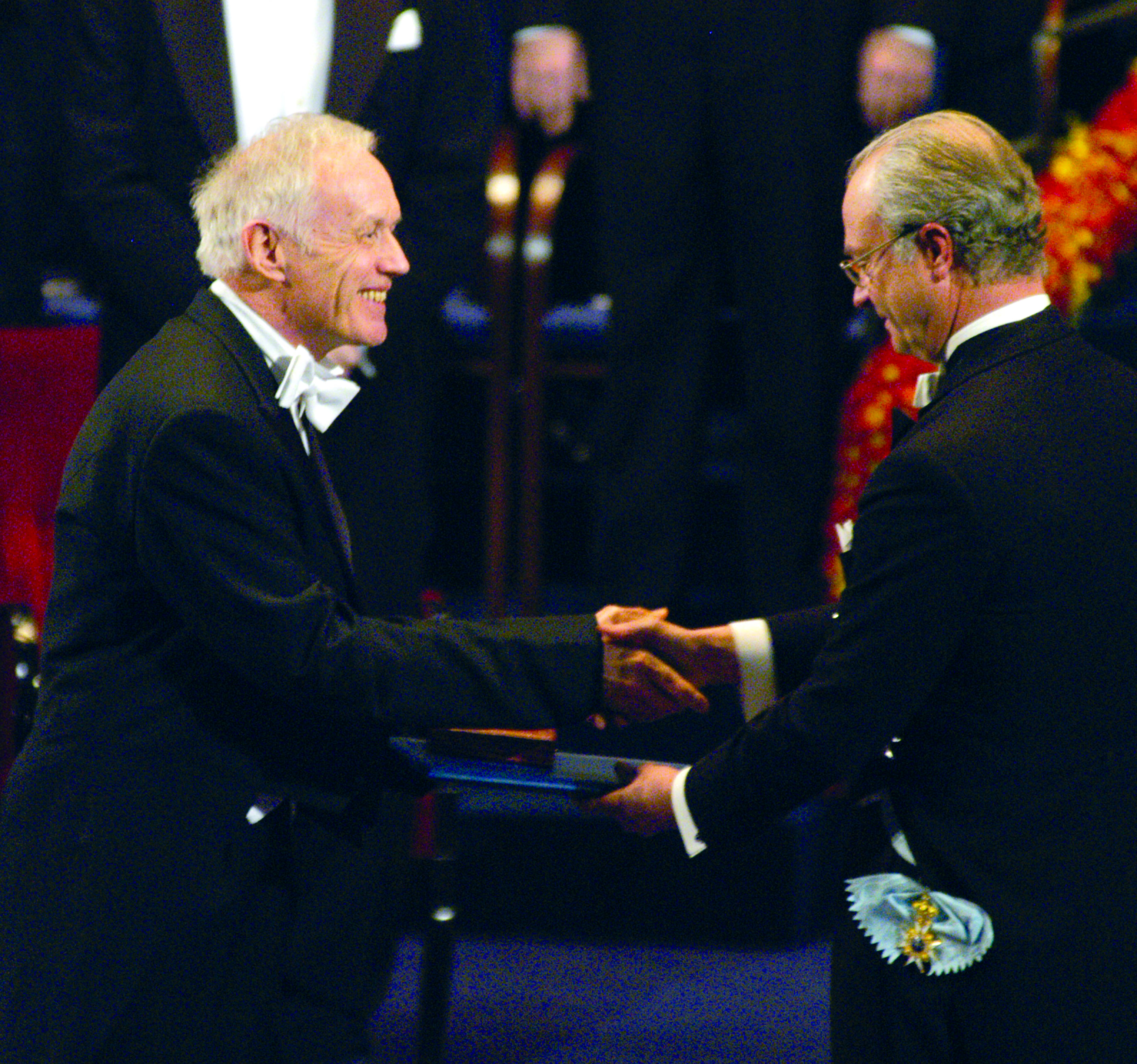 Anthony J. Leggett receives his Nobel Prize from King Carl Gustav. Photos taken at the Nobel Prize ceremonies in Stockholm Sweden in December 2003.