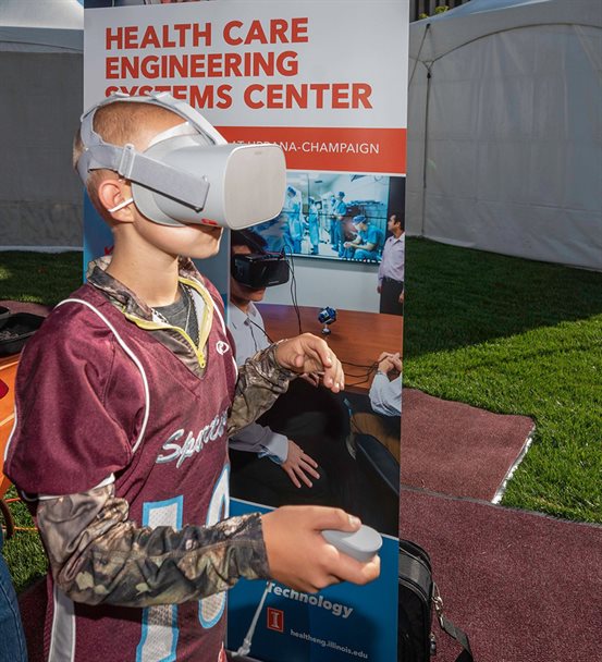 Child working with virtual reality headset