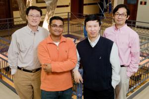 (l to r) Fei Wang, professor of cell and developmental biology; Farhan Chowdhury, doctoral student in mechanical science and engineering: Ning Wang, professor of mechanical science and engineering; and Tetsuya Tanaka, professor of animal sciences.