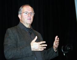 Microsoft's Craig Mundie addresses students and faculty at the Alice Campbell Alumni Center.