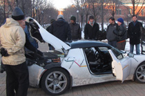 Braving extremely cold temperatures, interested students and staff talked with the Tesla representatives about the electric Roadster as it was displayed outside Everitt Lab.