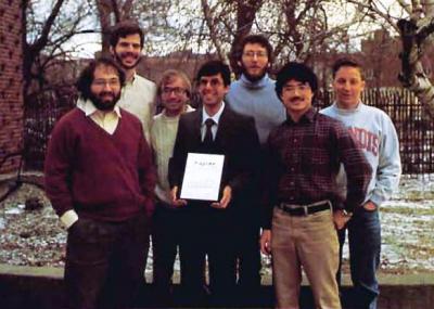 Illinois'  winning team (from left): Stephen Wolfram, Stephen Omohundro, Arch Robison (MS 87, PhD 90, CS), Steven Skiena (holding the TABLET) (MS 85, PhD 88, CS), Bartlett Mel (PhD 89, CS), Luke Young (PhD 93, EE), and Kurt Thearling (MS 88, PhD 90 EE).