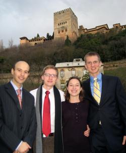 (l to r) CEE alumni Fernando Moreu, Keith Schinkoeth, Gen Long and David Bennier pose before the Alhambra, a palace and famous landmark in Grenada.