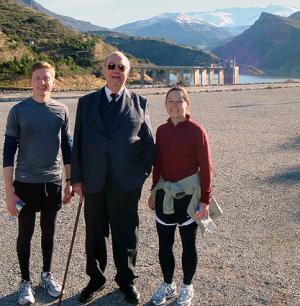 Keith Schinkoeth, D. Guillermo Bravo, and Gen Long after the race. The Canales Dam and Sierra Nevadas are in the background.