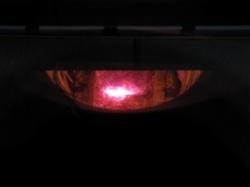 Photo of the electron beam heating and creating a plasma and glow on a solid lithium target.