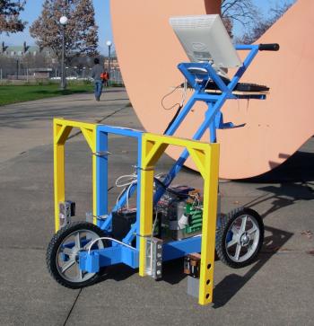 The corn stalk counter is built on a tricycle-style frame and employs a laser-based photo-interruption mechanism.