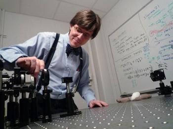 Paul Kwiat in his quantum optics laboratory