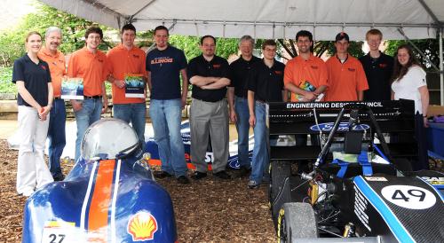 Mechanical Science and[cr][lf]Engineering volunteers displaying the formula SAE cars during the Majors[cr][lf]Fair.
