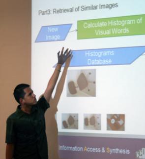 DSSI student discussing DSSI Computer Vision project.