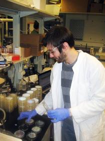 CEE graduate student Ian Bradley works on improving the biosand filter back in the lab