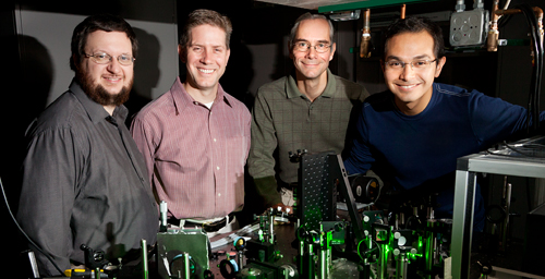 (l to r) Eric Chaney, a research specialist at the Beckman Institute; Stephen Boppart, a professor of electrical and computer engineering, of bioengineering and of medicine; Martin Gruebele, a professor of chemistry and of physics; and Wladamir Benalcazar, a graduate fellow at the Beckman Institute.