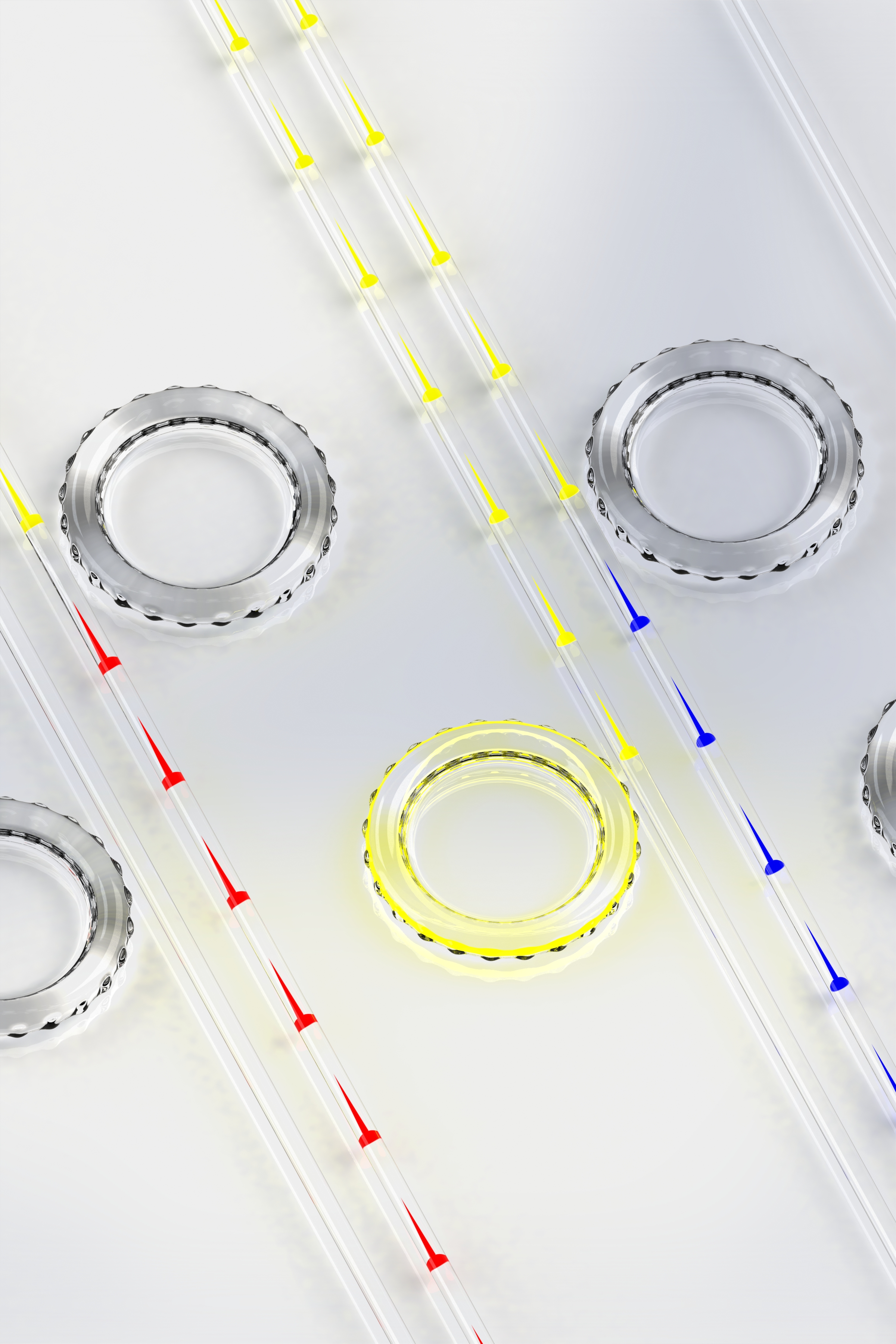 Artist visualization of slow light, fast light, and one-way light blocking using BSIT in a series of silica microresonators (slow/red, fast/blue; central yellow shows blocking effect).
