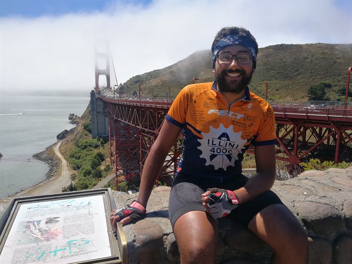 Viraat Goel (B.S. '19, Bioengineering) takes it easy near the Golden Gate Bridge in San Francisco after finishing the 14K trek from New York City as part of Illini 4000 Bike America Team ride during summer 2019.