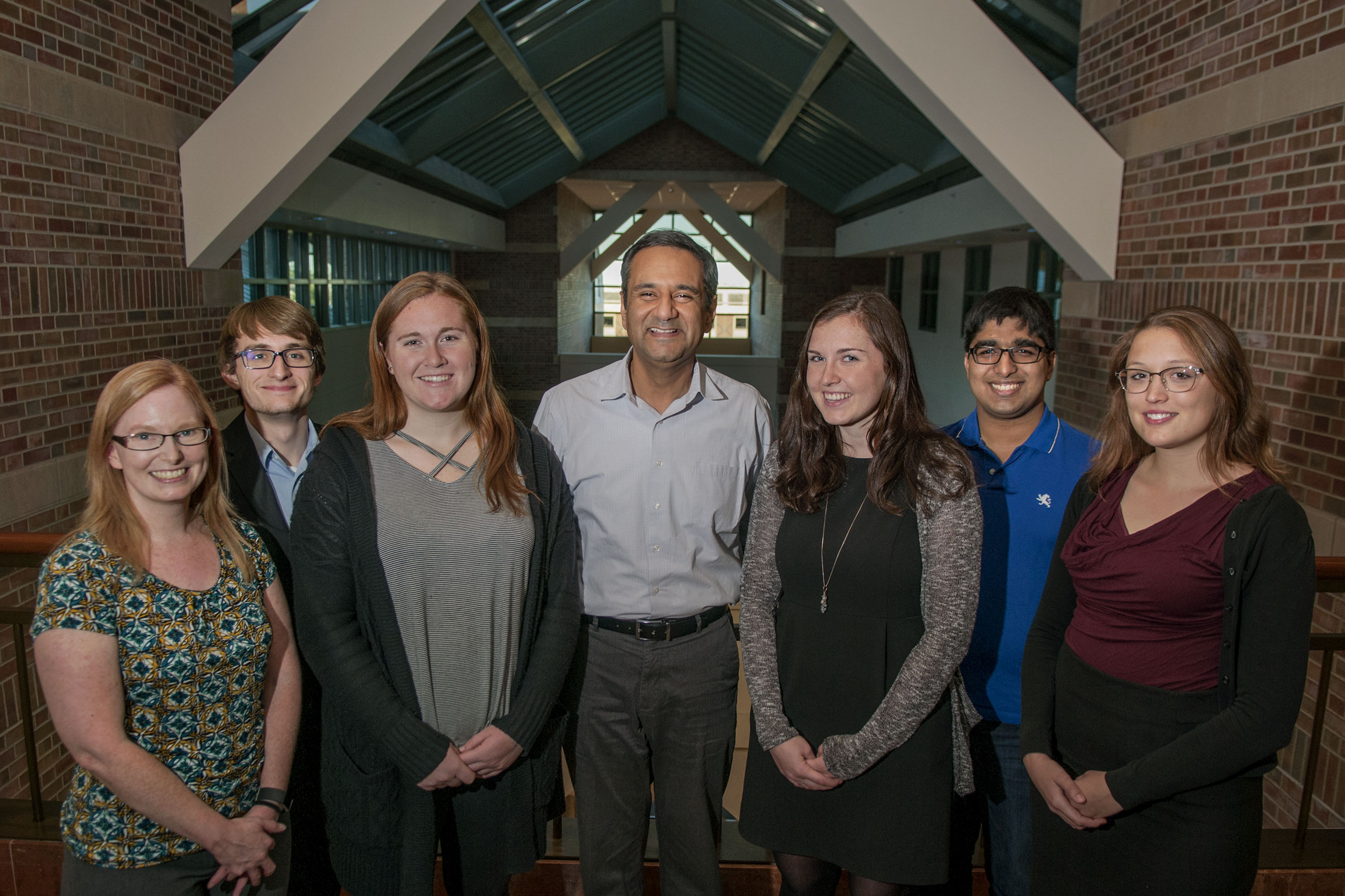 Cancer Scholars director Rohit Bhargava (center) joins program advisor Marcia Pool (far left) and a few of the first cohort of undergraduate students Pierce Hadley, Lauren Sargeant, Madelyn Oâ€™Gorman, Sreyesh Satpathy, and Miranda Dawson outside Bhargavaâ€™s office at Beckman Institute.