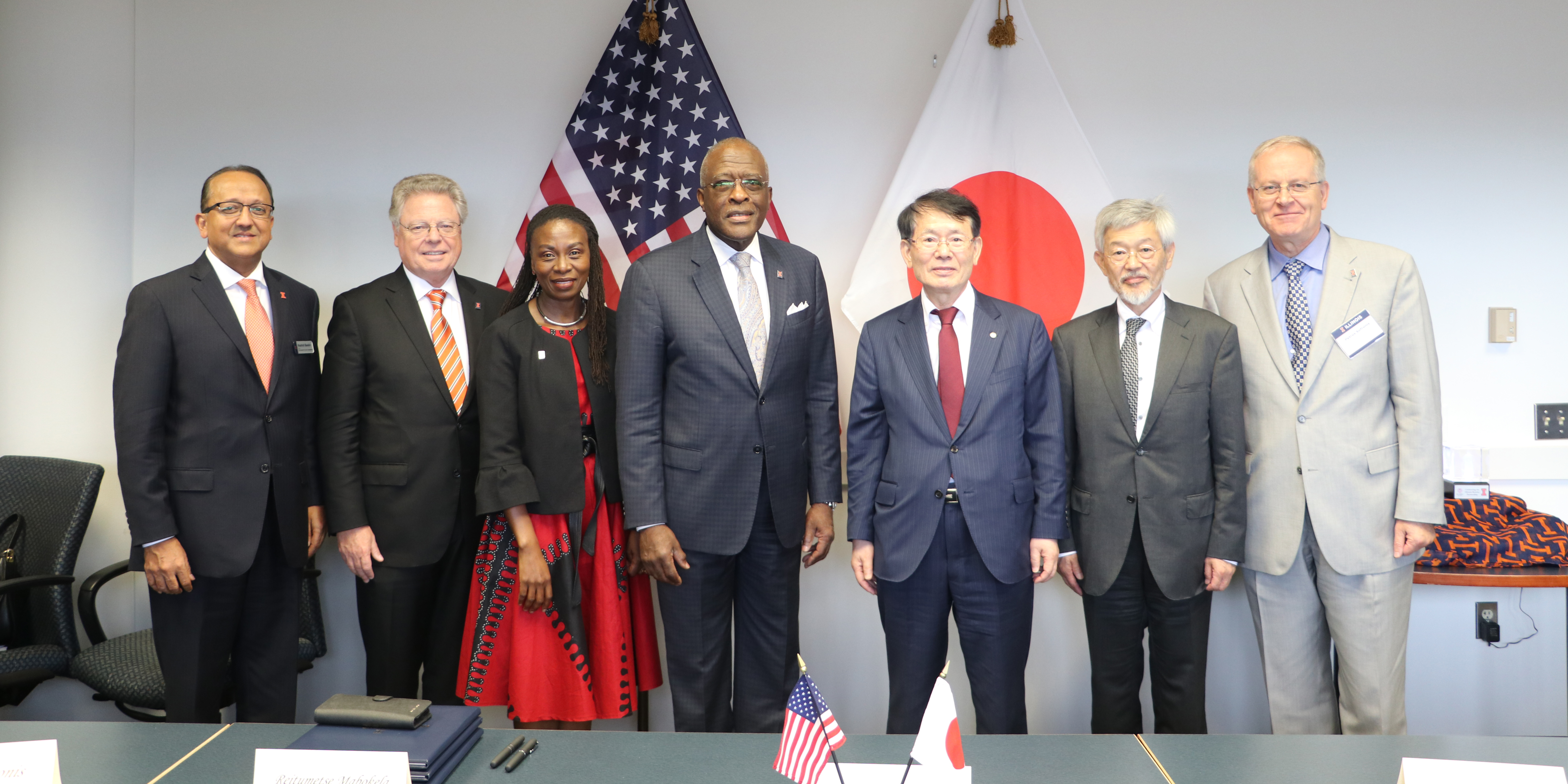 Kyushu University and the University of Illinois at Urbana-Champaign (Illinois) renewed their academic exchange agreement and established a new strategic partnership. Dignitaries on hand for the MOU signing included  (From left to right): Rashid Bashir, Dean of The Grainger College of Engineering; Illinois Provost Andreas Cangellaris, Illinois Vice Provost Reitumetse Obakeng Mabokela, Illinois Chancellor Robert J. Jones, Kyushu President Chiharu Kubo, Kyushu Executive Vice President Masato Wakayama, and Illinois professor Petros Sofronis, Director of I2CNER.