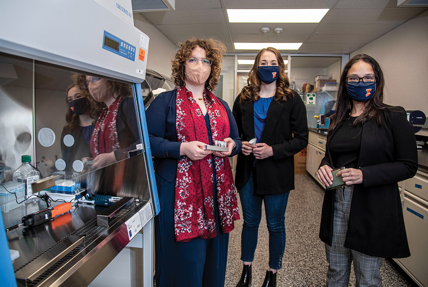 Abigail Wooldridge and her students in their lab