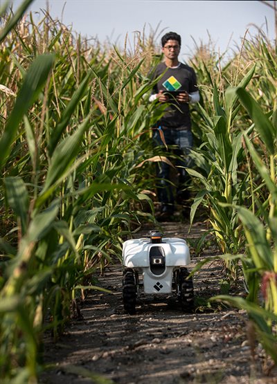 Robot navigates corn field as Chinmay watches