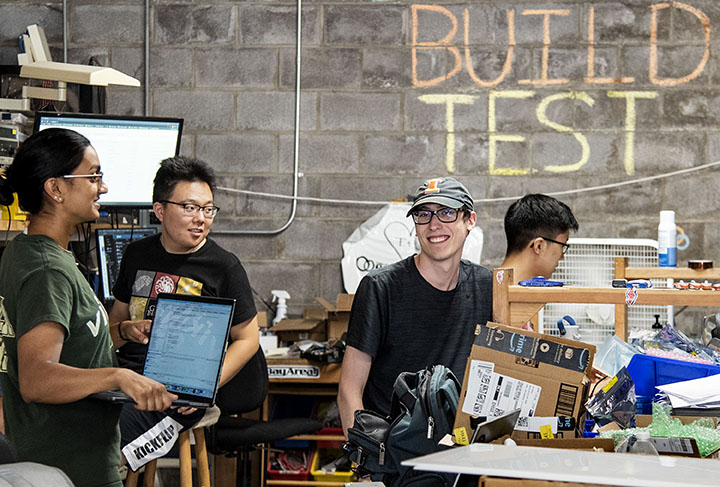 Alex Chmiel works with Illini Solar Car teammates