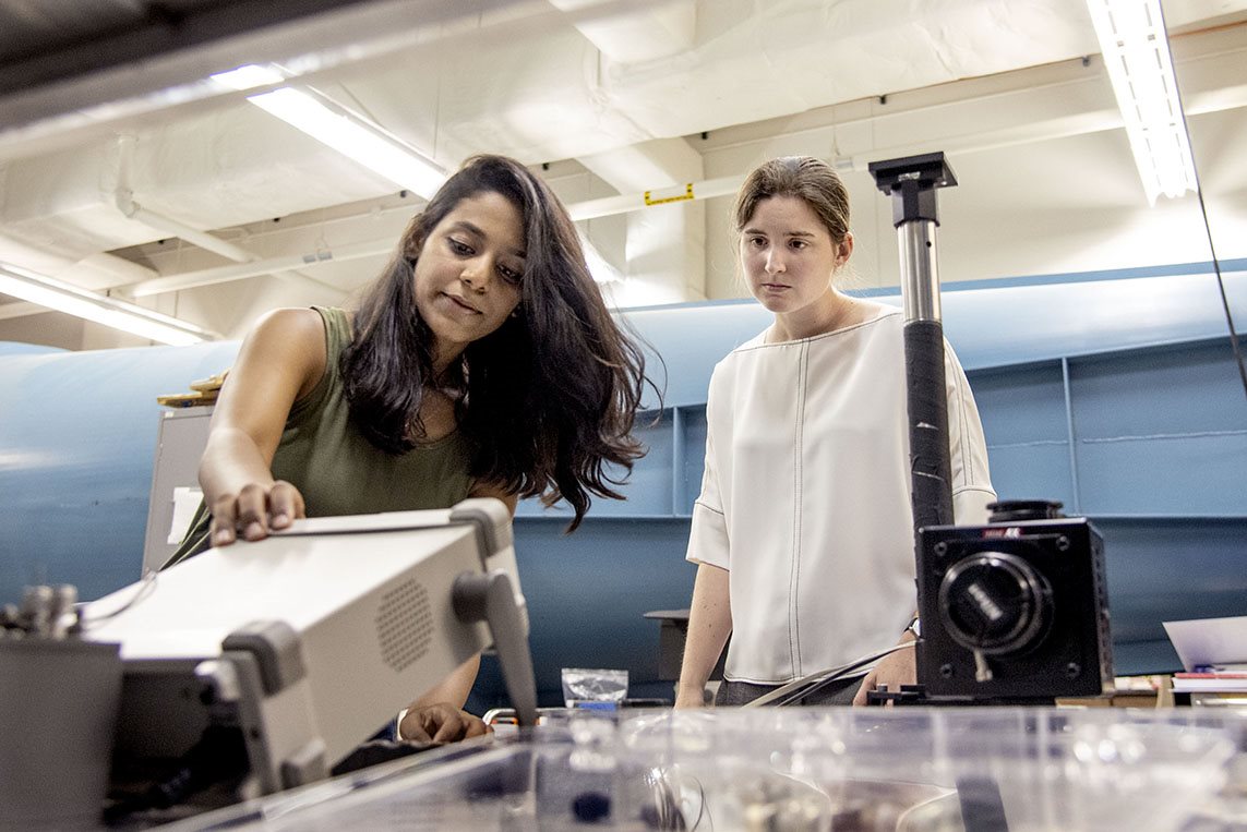 Student and professor in lab