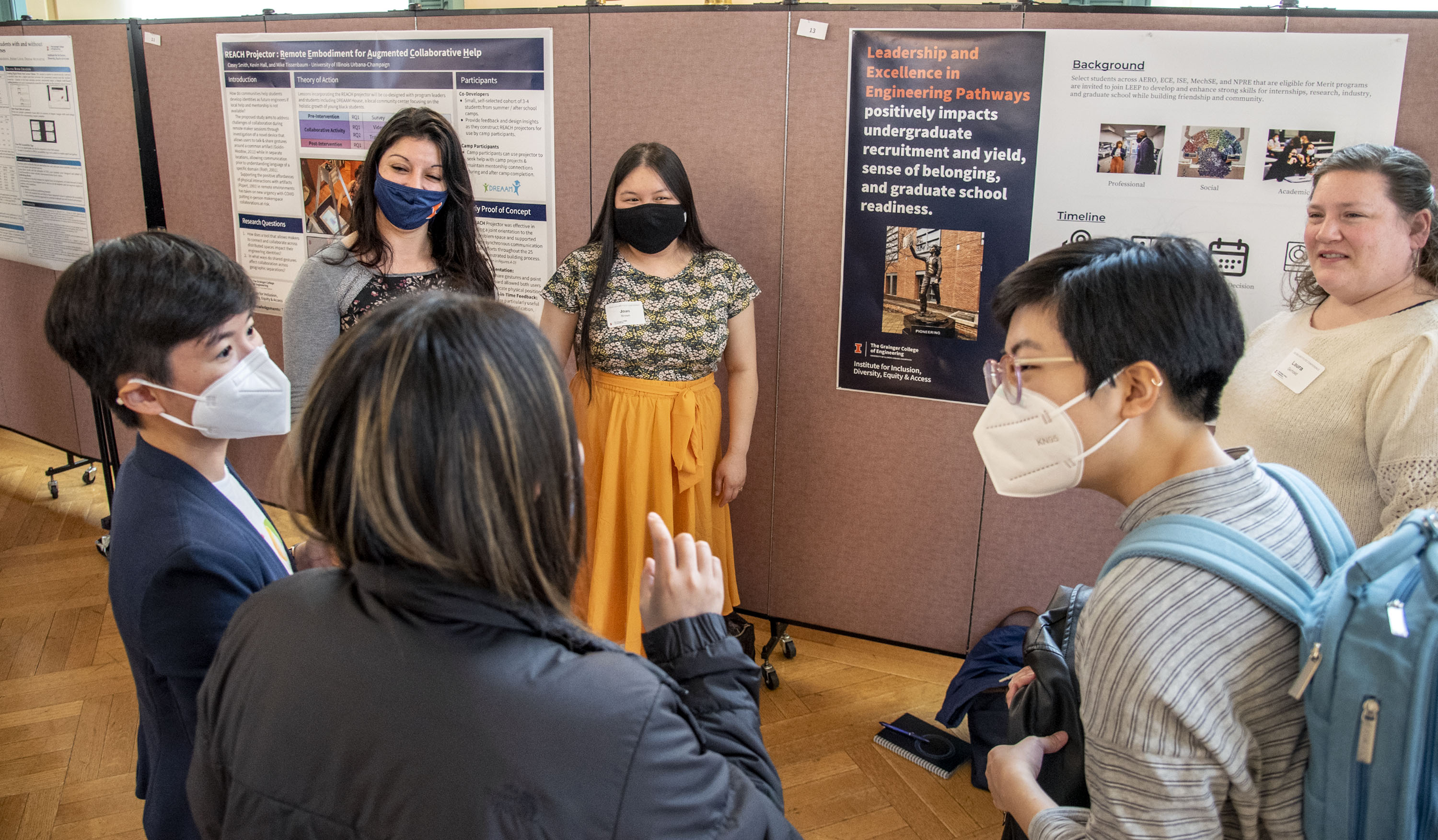 Members of the GIANT program team, Leadership and Excellence in Engineering Pathways (LEEP) share their research with attendees at the conference. (Heather Coit/Grainger Engineering)