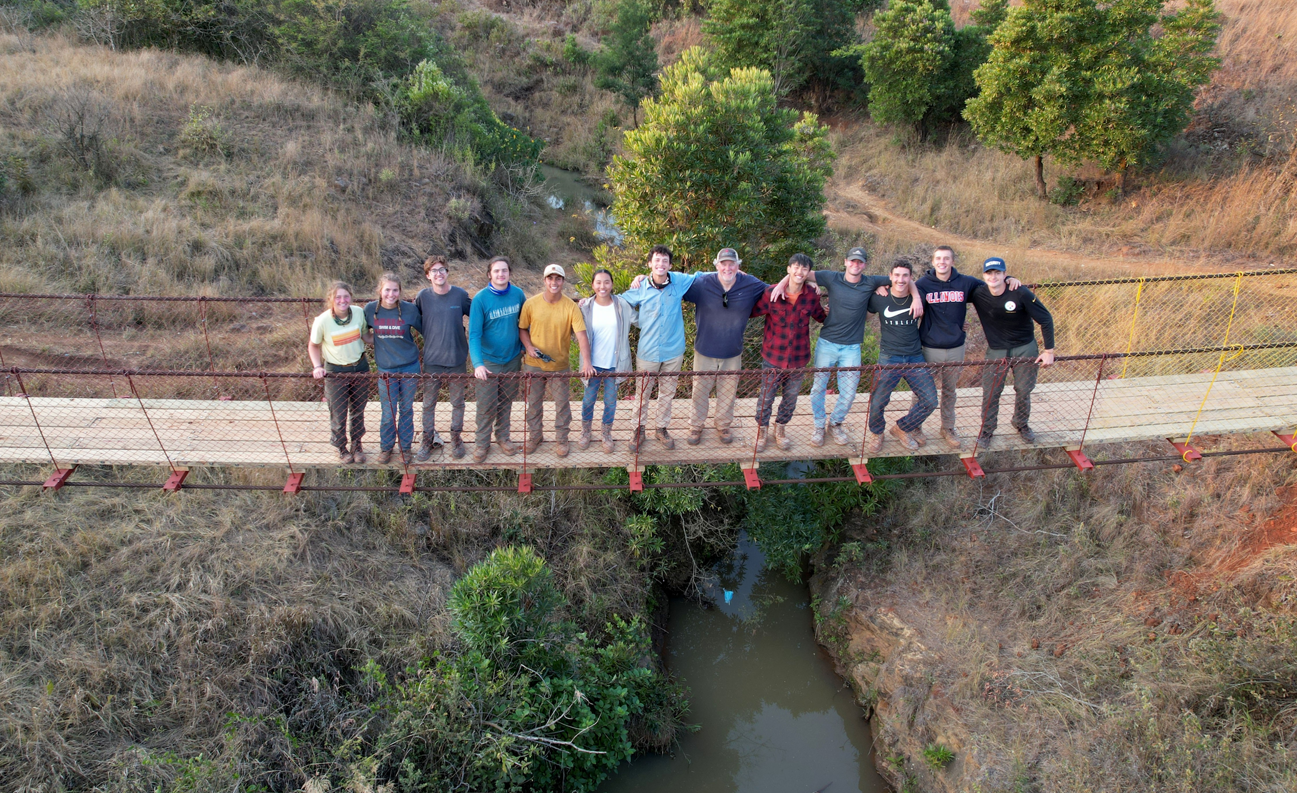 Grainger Engineering students with the EIA Bridge Program join the Virginia Tech and University of Iowa teams on the completed KaZenzele Footbridge in Eswatini. The University of Illinois team are: Rachel Chen (B.S. &amp;amp;amp;rsquo;25, Civil Engineering), Colin Zimmers (B.S. &amp;amp;amp;rsquo;24, Engineering Mechanics), Aaron Perez Arraya (B.S. '26, Engineering Undeclared), Dion Shen (B.S. '25, Civil Engineering) and Soren Mayendia (B.S. '25, Civil Engineering). (Photo courtesy of Rachel Chen)