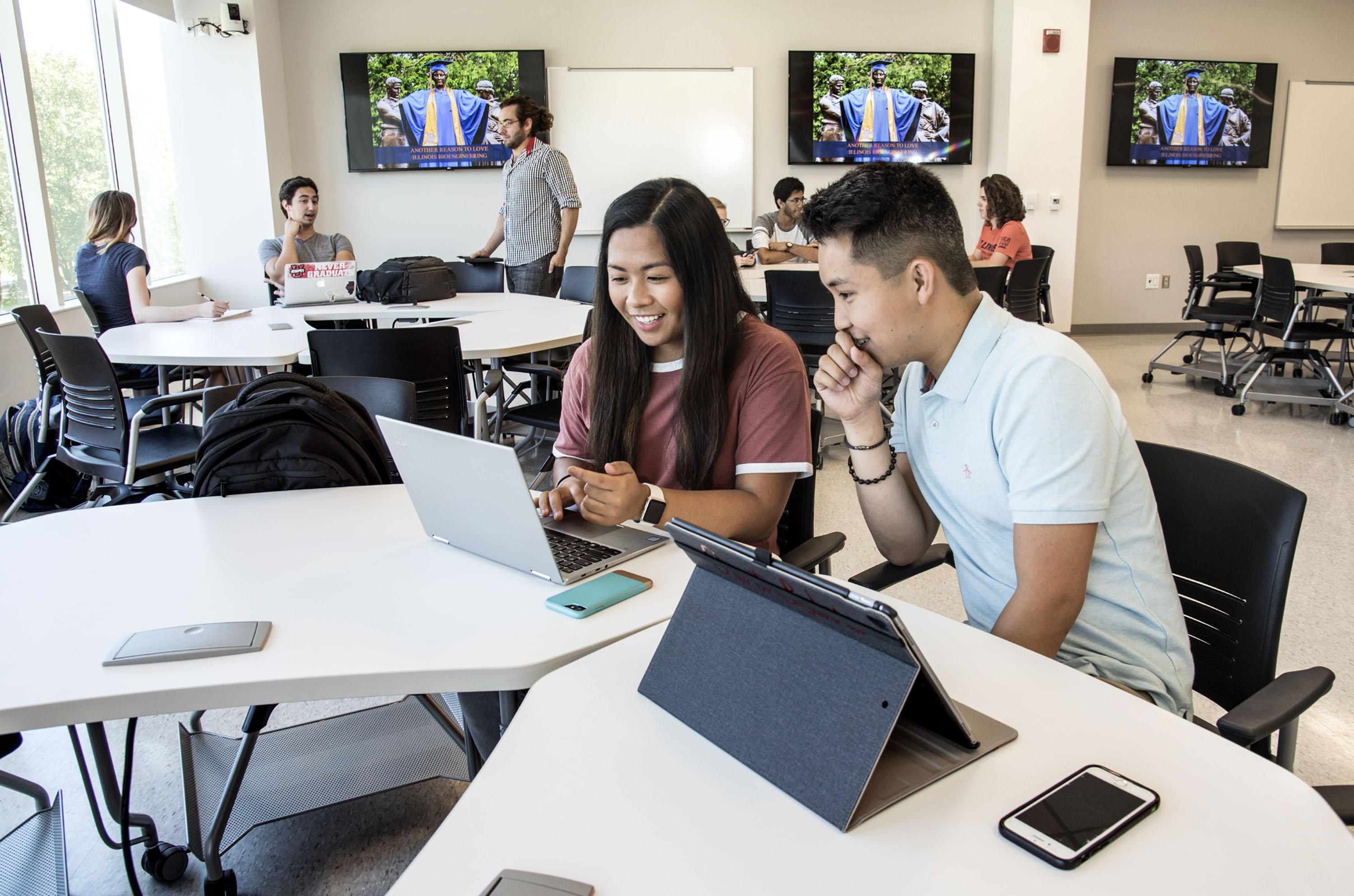 Two students studying in an active learning space