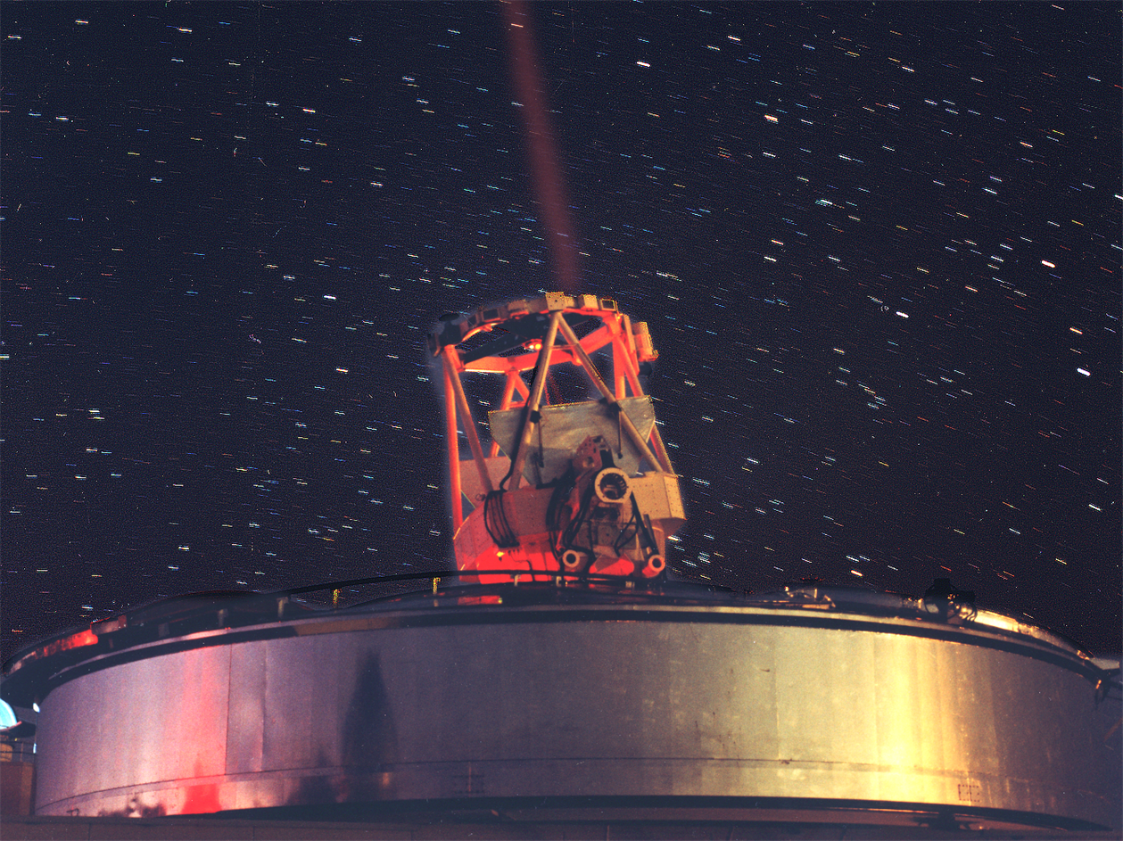 Enhanced image of the 3.5 m telescope at the Starfire Optical Range on the Kirtland Air Force Base. Faint sodium lidar beam can be seen.