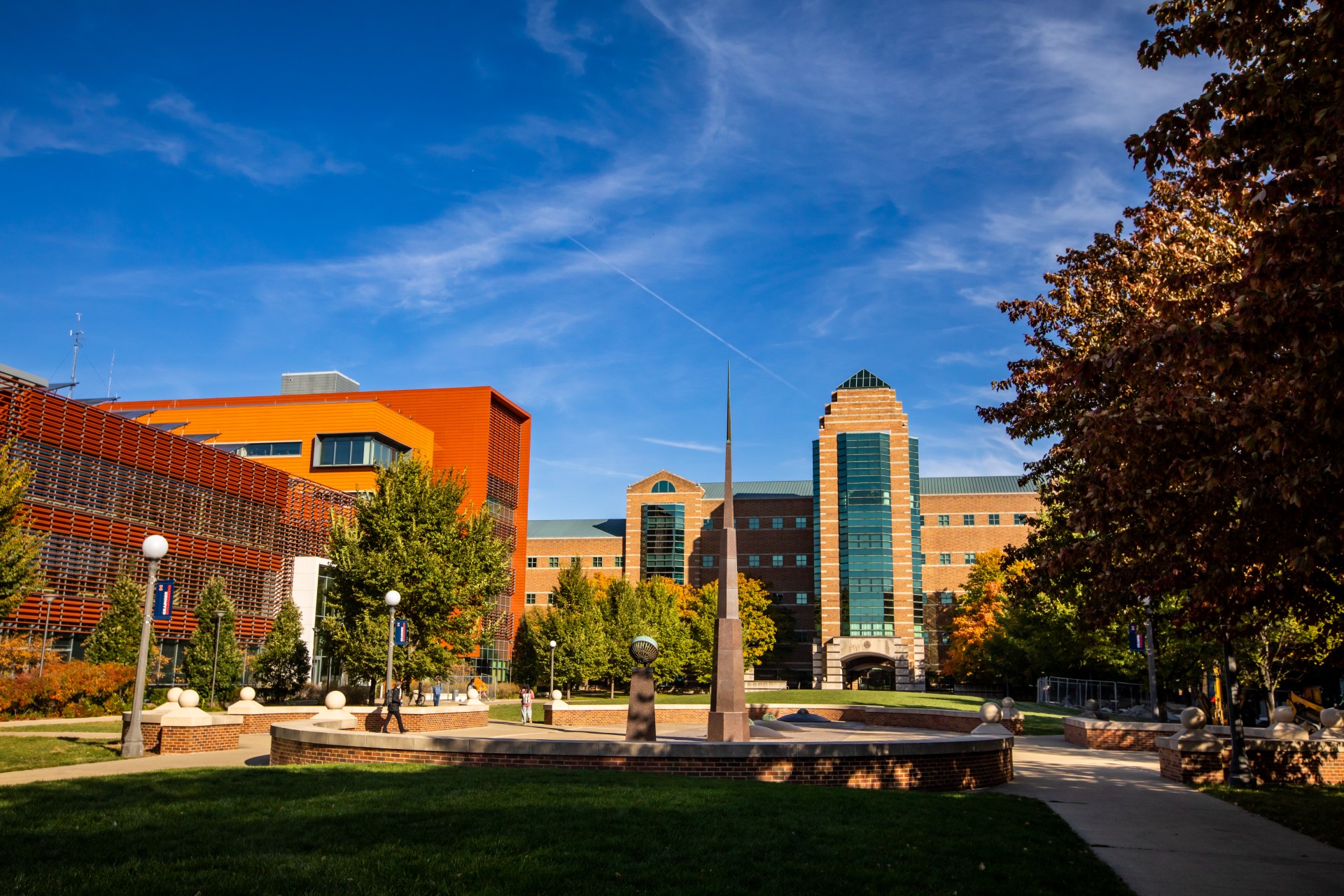 A low shot of the Beckman Institute for Advanced Science and Technology and the Electrical and Computer Engineering Building on a sunny fall day.