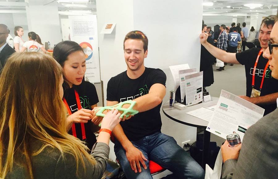 young man demonstrating new cast