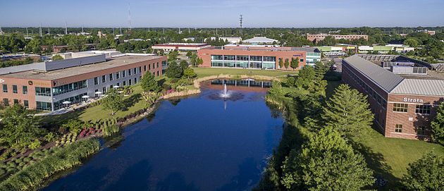 image of the research park; building complex with small pond in the middle