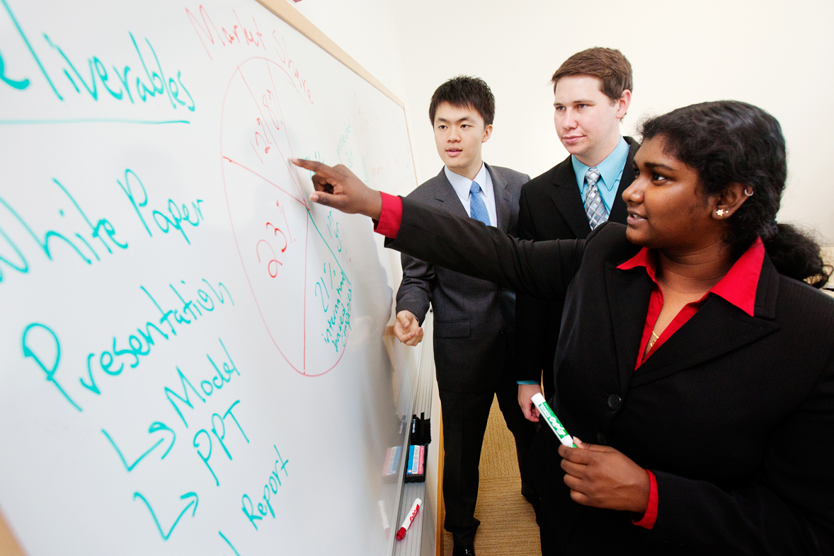 Students and teacher working together