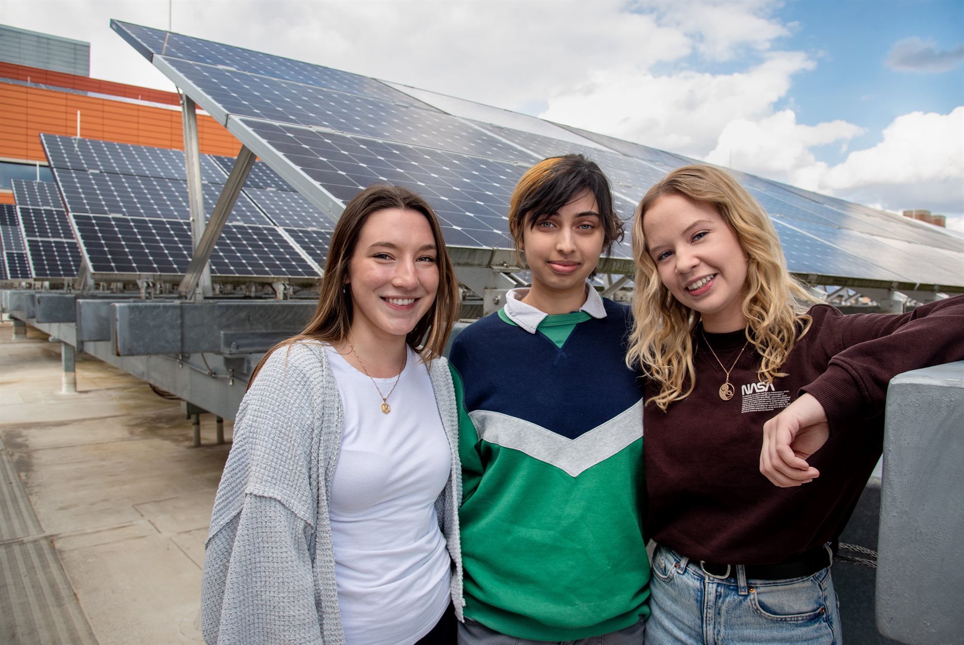 students with solar energy panels