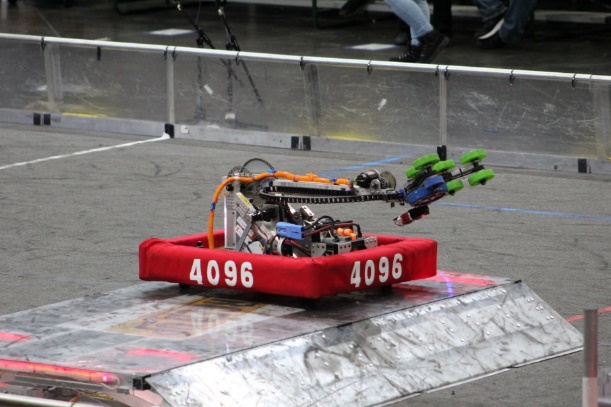 <em>Ctrl-Z&rsquo;s robot perched on a charging station during the world championships. Photo: @JayFloresInspires.</em>