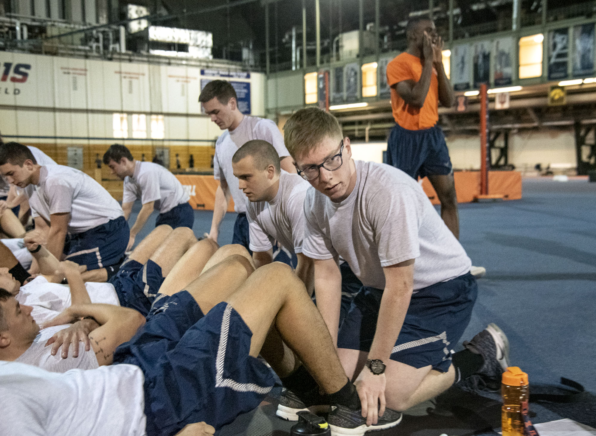 Ryan Nixon, who recently finished his freshman year enrolled in Mechanical Science and Engineering, pairs up with a fellow Air Force ROTC cadet for early morning physical training (PT) at the UI Armory earlier during spring semester. &lt;em&gt;Photo by Heather Coit&lt;/em&gt;