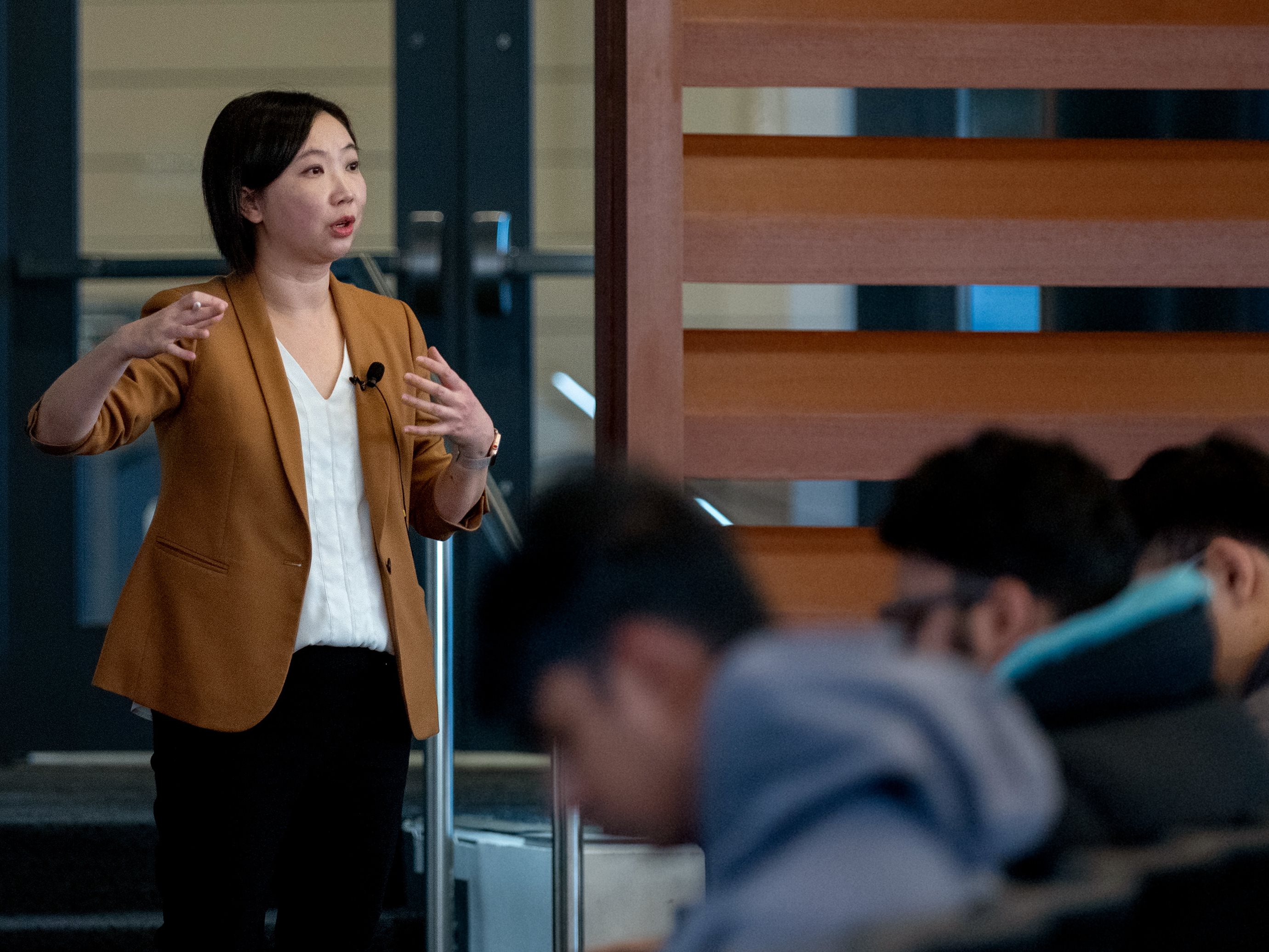 Yuting Wu Chen teaching ECE 220 in the Grainger Auditorium of ECEB.