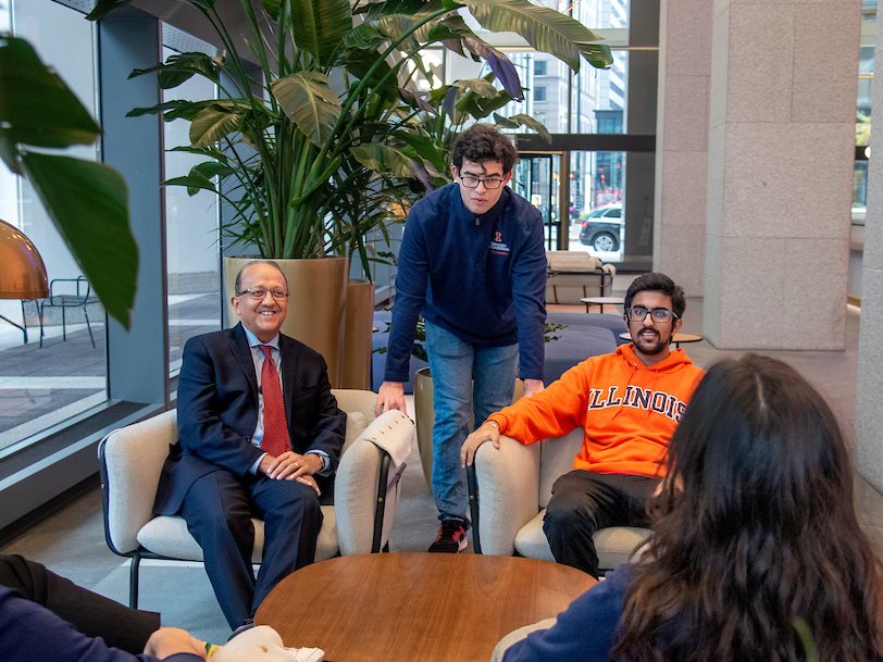 Rashid Bashir meets with City Scholars, from left, Jingbo Li, Raul Higareda  (standing), Siddharth Tangri and Allison Daemicke at Illini Center on Oct. 27, 2023.