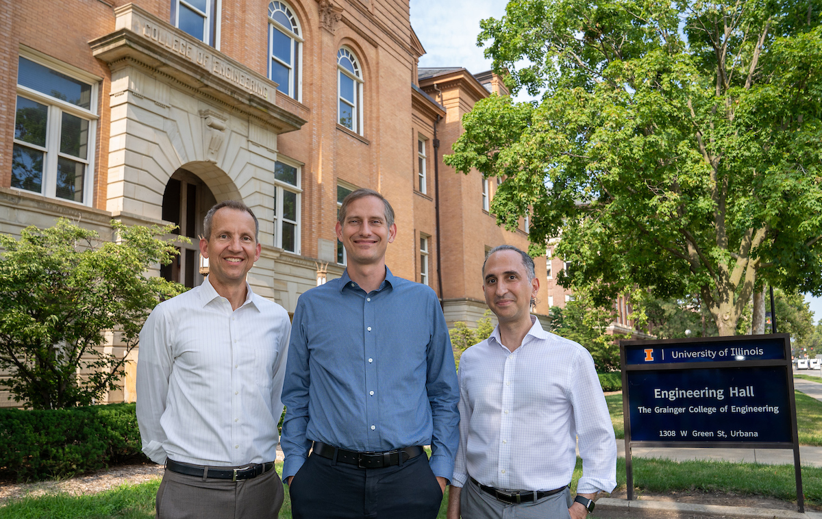 John Burke, center, the Principal Director for Quantum Science with the Office of the Undersecretary of Defense for Research and Engineering (OUSD (R&amp;amp;E)) for Science and Technology (S&amp;amp;T), with Brian DeMarco, right, IQUIST Director, and Harley Johnson, left, Associate Dean for Research in the Grainger College of Engineering.