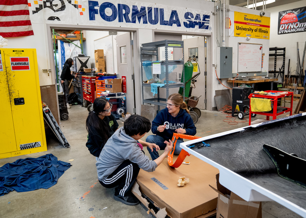 Illini Solar Car team works in the Engineering student project laboratory.