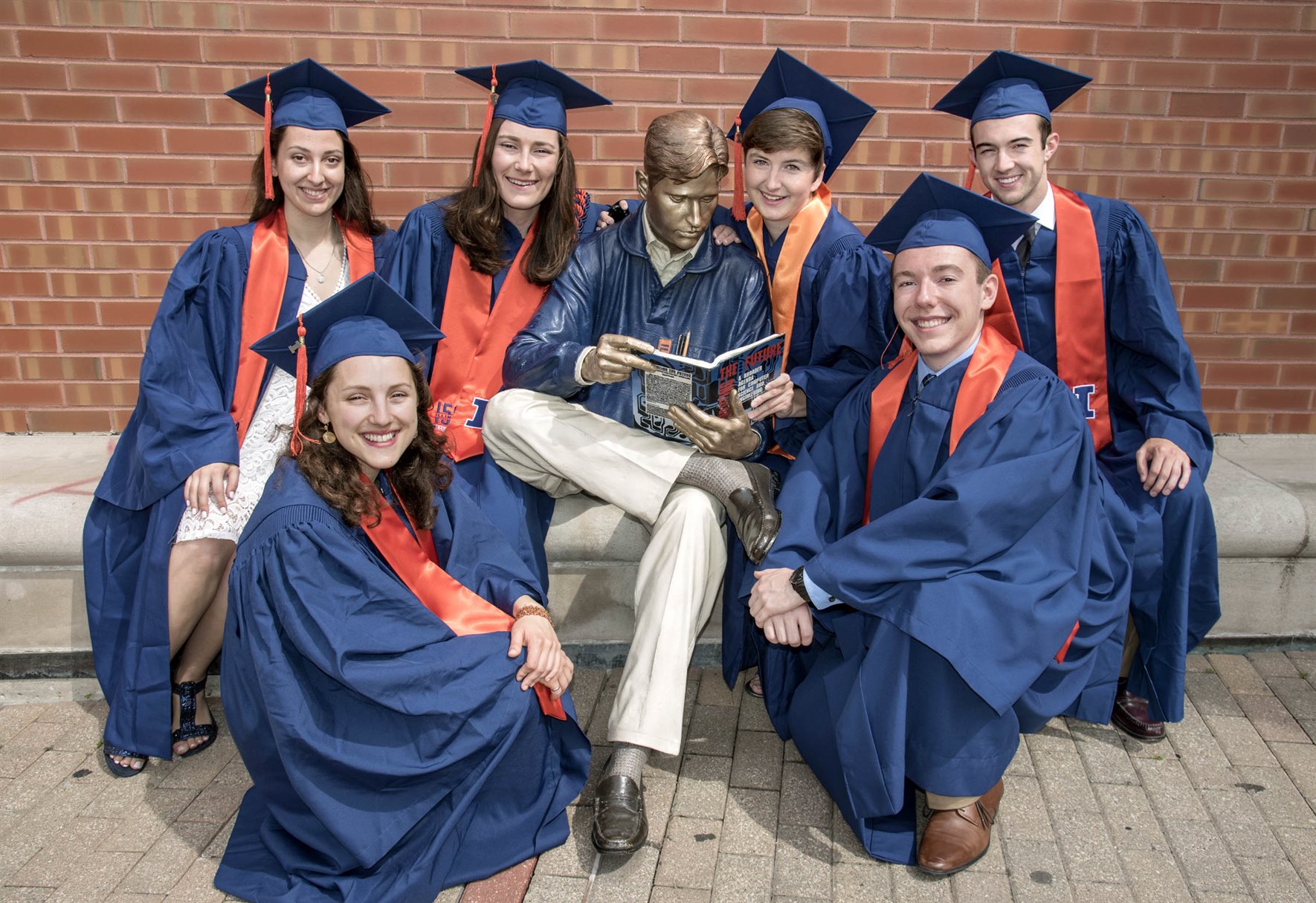 Mechanical Science and Engineering (MechSE) graduates gathered to pose for photos with the Grainger Bob statue while celebrating their hard work.