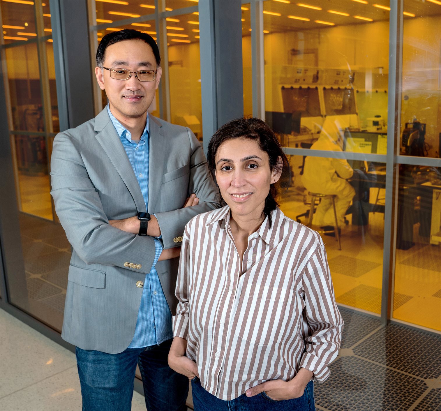 Professors Shaloo Rakheja, right, and Qing Cao infront of Nano Fabrication Lab at ECEB.